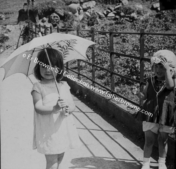 LITTLE GIRL WITH UMBRELLA